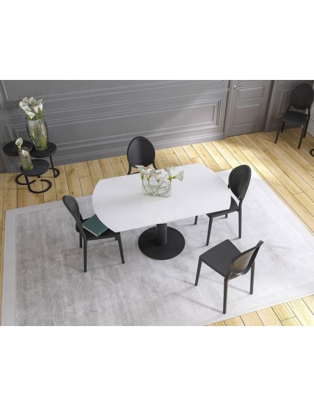 UNA - Table de repas extensible deux allonges intégrées pied central acier laqué noir